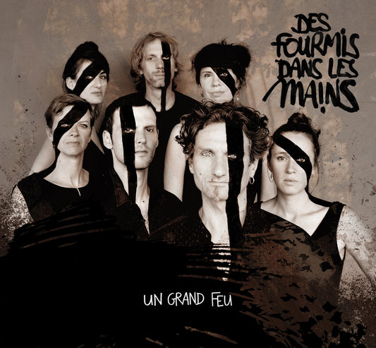 Pochette de : UN GRAND FEU - FOURMIS DANS LES MAINS (CD)